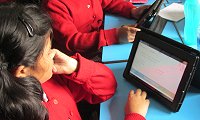 Students taking a test on mobile video